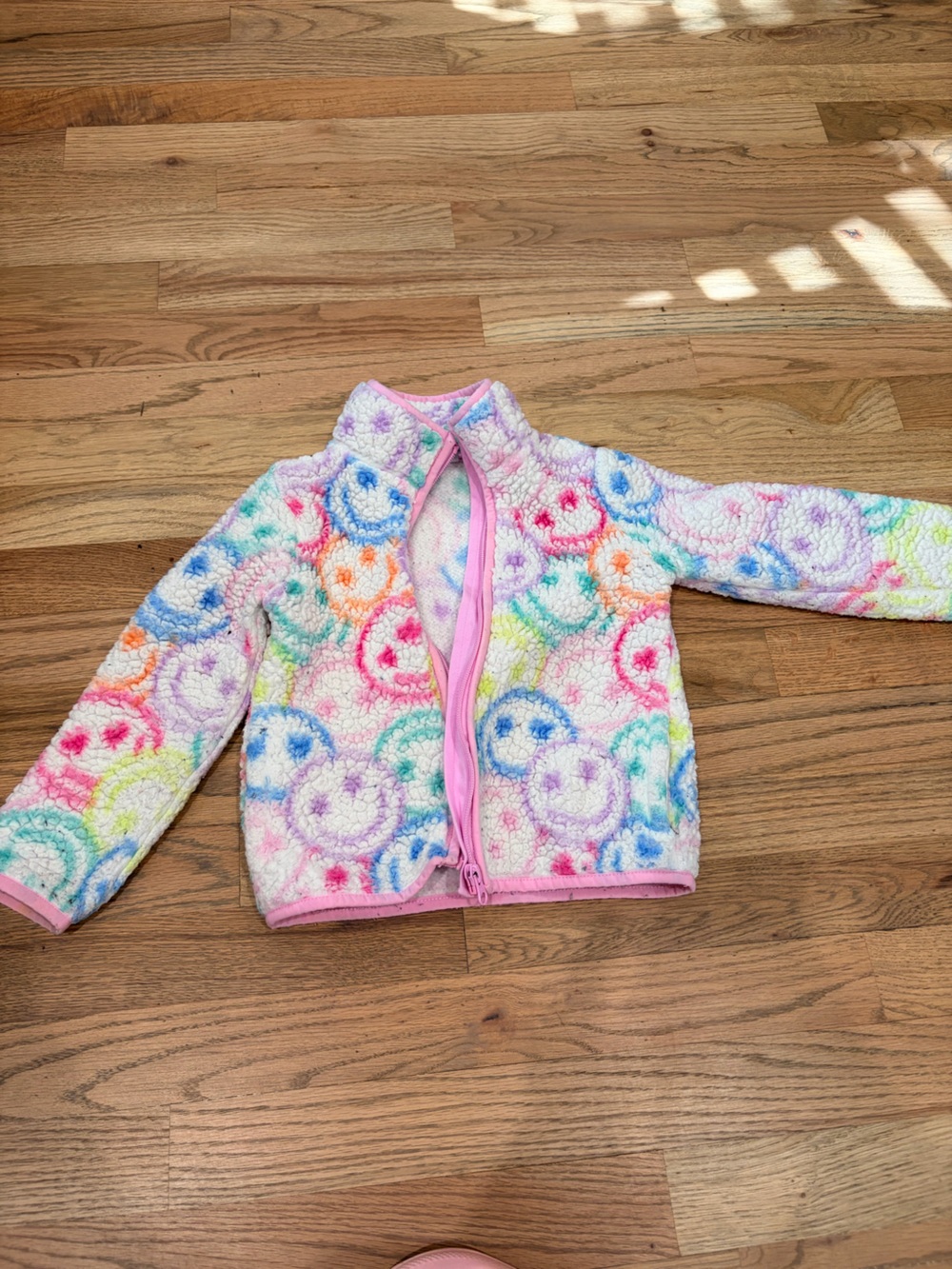 The Children’s Place smiley face fleece jacket